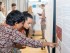 Participants viewing projects at the Design for Good End of Cycle 1 event
held at the Royal College of Art in June 2023