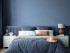 Home mockup, cozy dark blue bedroom interior background, 3d rend